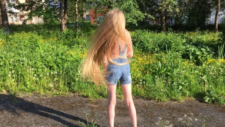 Kristina's Beautiful Hairplay in Nature with her Knee Length Blonde Tresses - Image 12