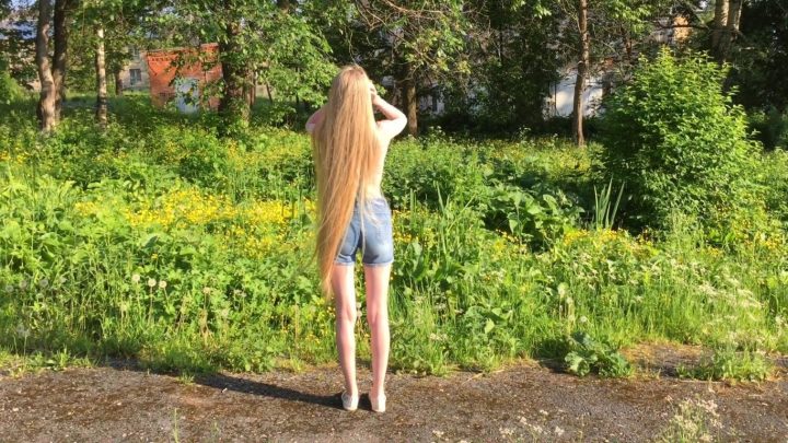 Kristina's Beautiful Hairplay in Nature with her Knee Length Blonde Tresses - Image 6