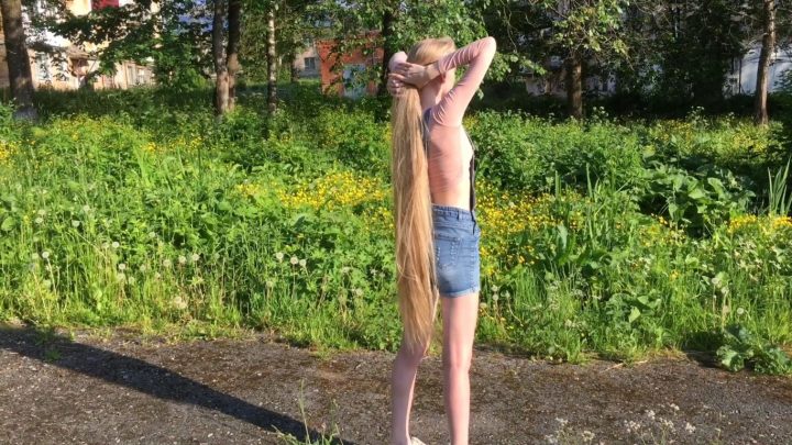 Kristina's Beautiful Hairplay in Nature with her Knee Length Blonde Tresses - Image 7