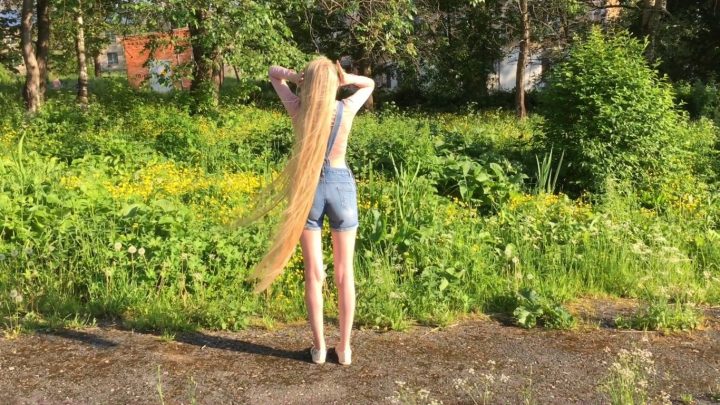 Kristina's Beautiful Hairplay in Nature with her Knee Length Blonde Tresses - Image 8